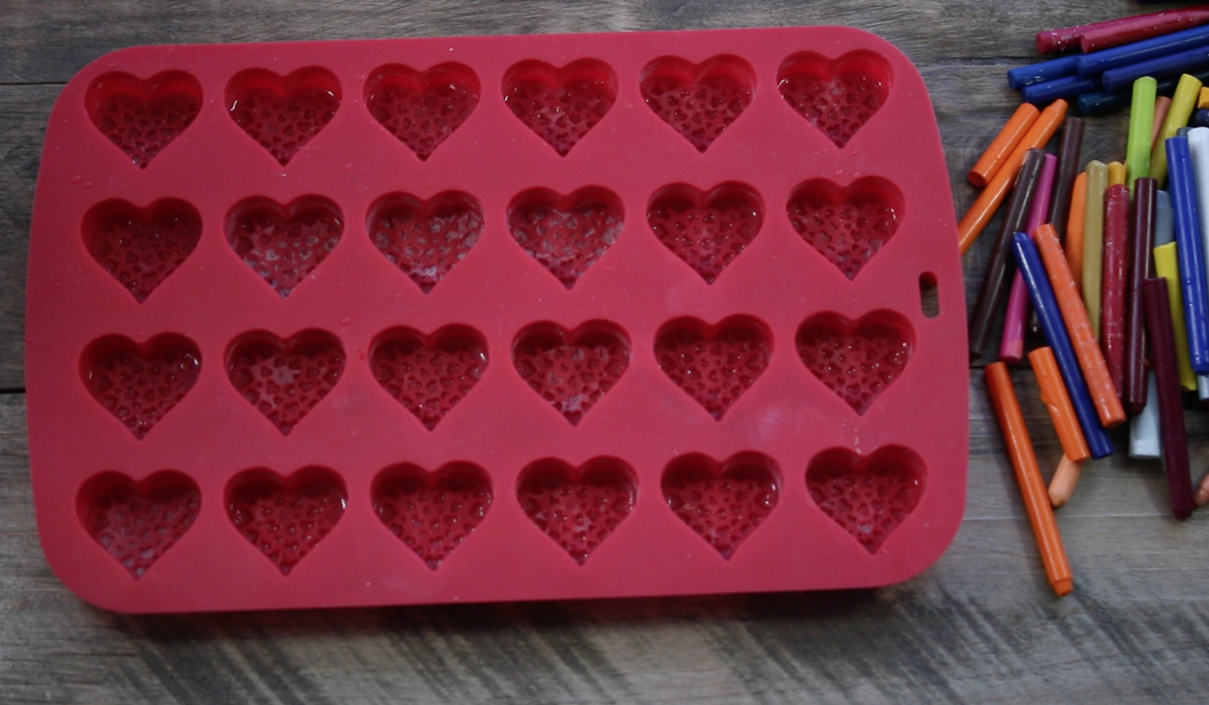 Repurpose old crayons to make a cute non-candy DIY project Microwave Melted Crayon Hearts for Valentine's Day! 