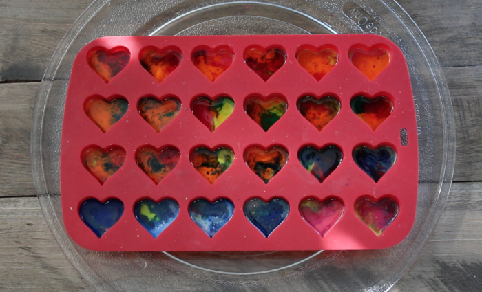 Repurpose old crayons to make a cute non-candy DIY project Microwave Melted Crayon Hearts for Valentine's Day! 