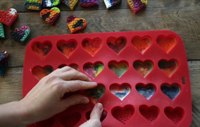 Repurpose old crayons to make a cute non-candy DIY project Microwave Melted Crayon Hearts for Valentine's Day! 